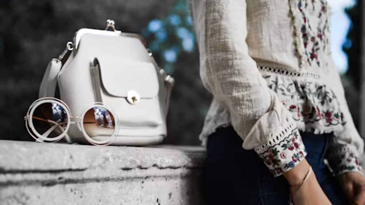 traveler crossbody bag train station in an everyday setting