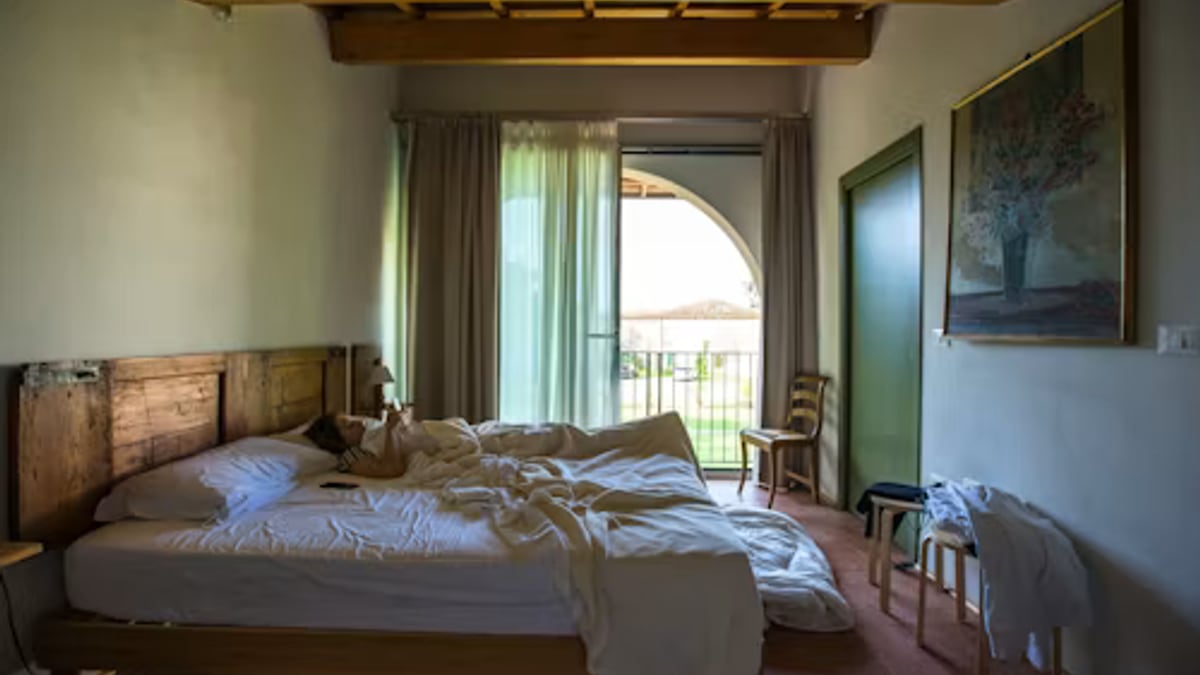 bright bedroom linen sheets morning in an everyday setting