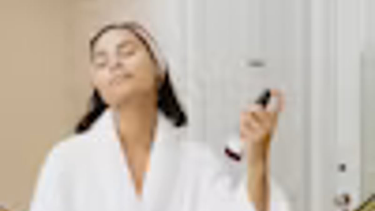 person gentle skincare bathroom routine in an everyday setting